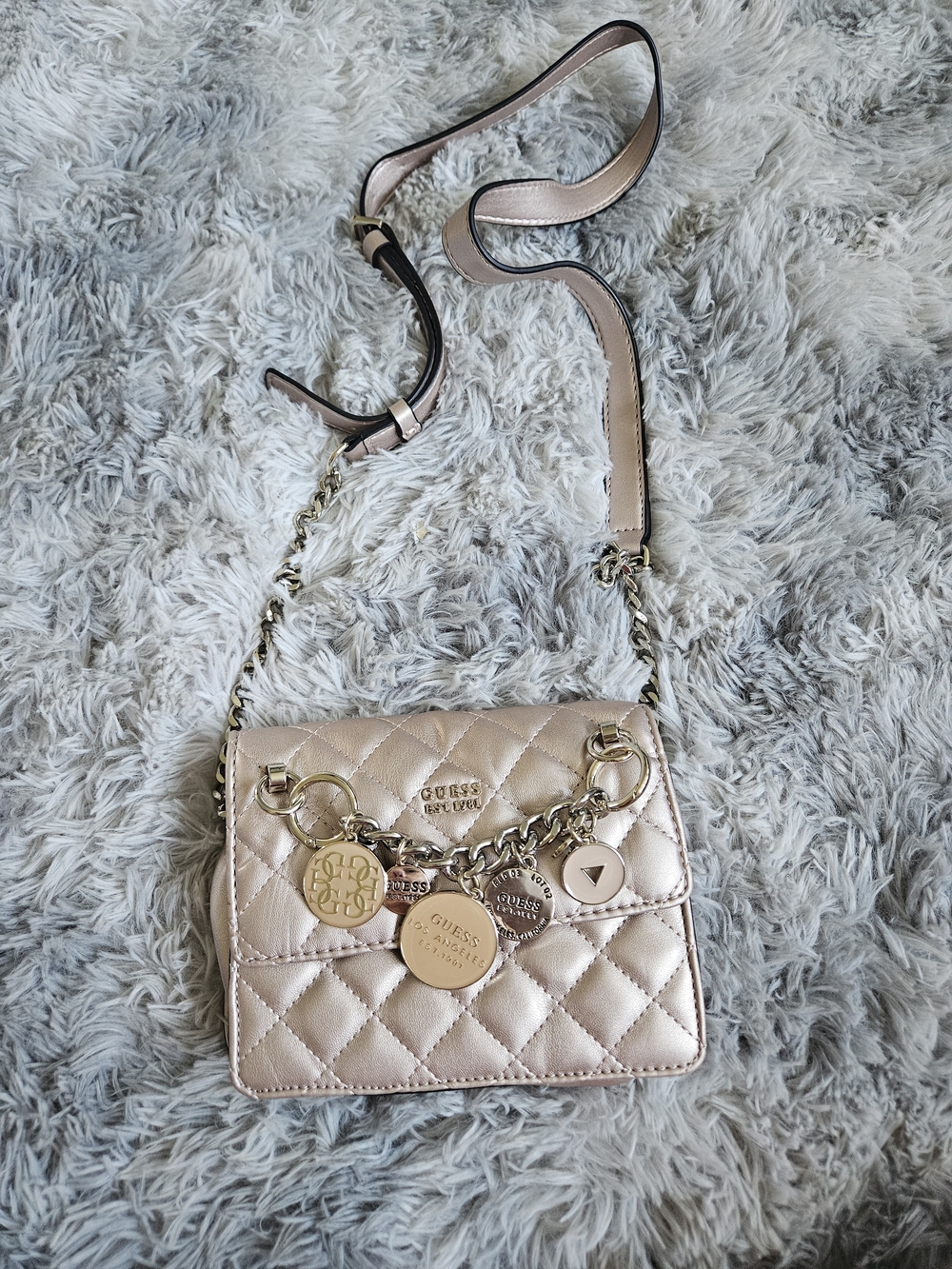 GUESS Victoria Mini Chain Crossbody bag in champagne pink